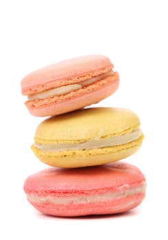 Stack of macaron cakes. Close up. White background.