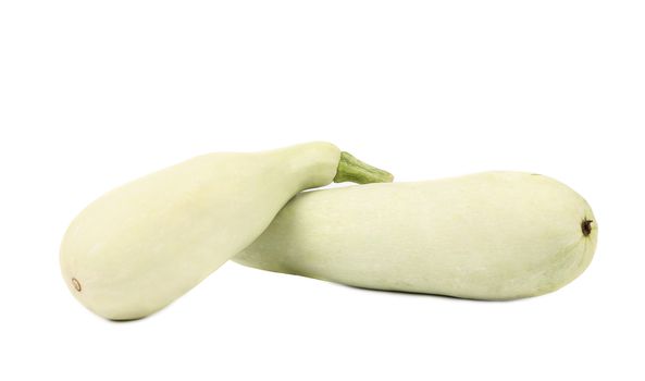 Fresh white eggplants isolated on a white background.
