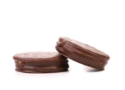 Two biscuit sandwich with chocolate. White background.