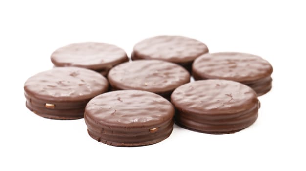 Seven biscuit sandwich with chocolate. White background.