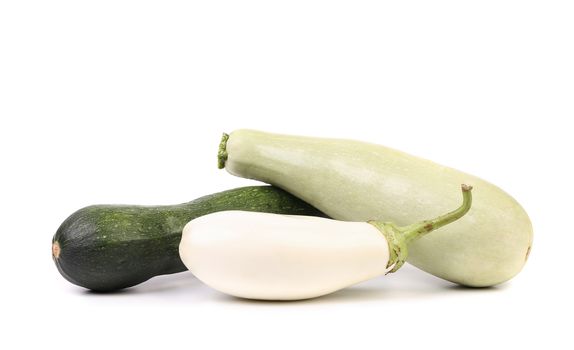 Different zucchini and white eggplant. White background.