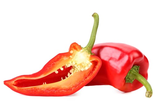 Red pepper and slice isolated on a white background