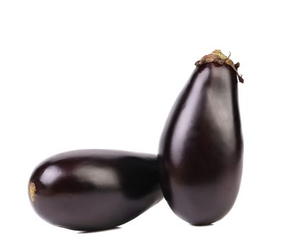 Two black eggplants isolated on a white background.