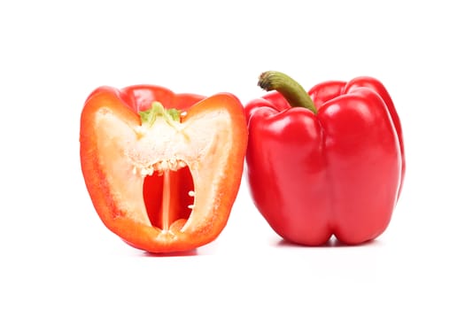 Sweet pepper and slice isolated on a white background