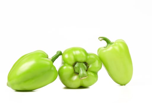 Green peppers isolated on a white background.