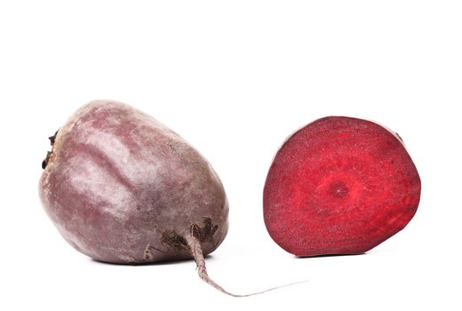 Fresh beetroot and slice isolated on a white background.