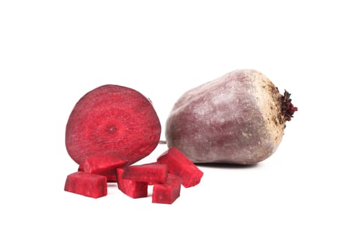 Fresh beetroot and segments on a white background