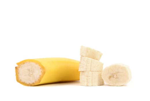 Cuted ripe bananas and slices isolated on a white background.
