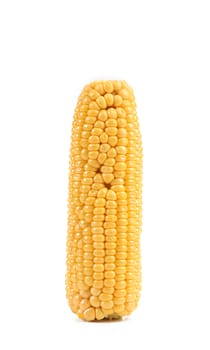Boiled corn on a white background. Vertical.