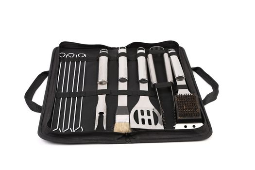 Set of tools for bbq in black bag. White background.