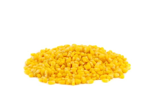 Handful canned corns. Close up. White background.