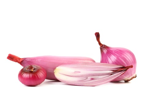 Organic red onions and slice isolated on a white background