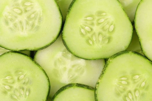Background of slices cucumber. Macro. Whole background.