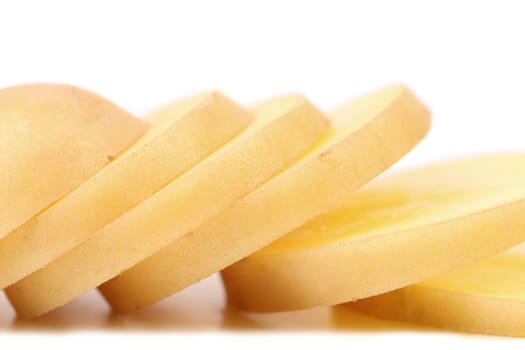 Potato slices isolated on a white background.