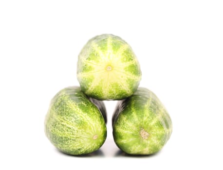 Three tails of cucumber isolated on a white background.