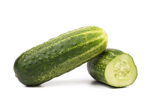 Split of cucumber isolated on a white background..
