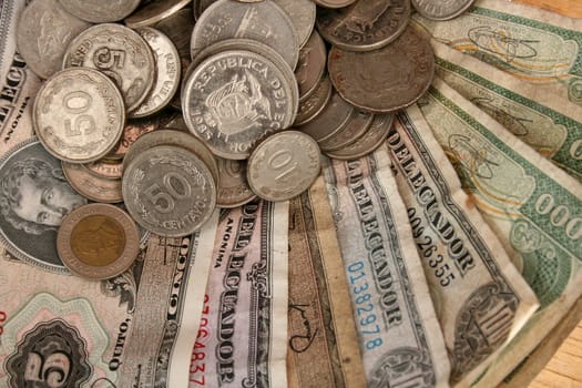 Discontinued paper money and coin currency from Ecuador for sale at the outdoor market in Otavalo