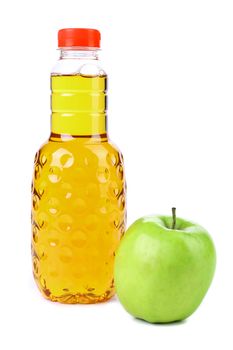 Delicious apple juice in plastic bottle. White background.
