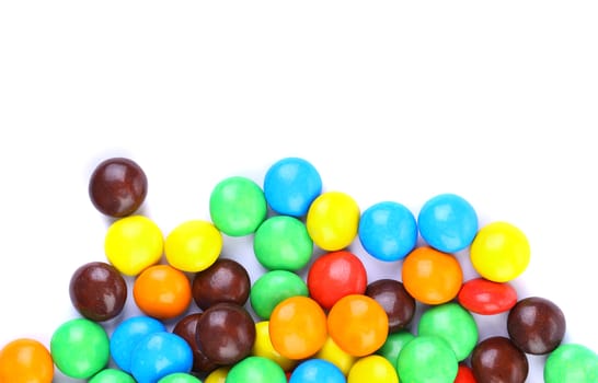 group of colored chocolate balls, on a white background