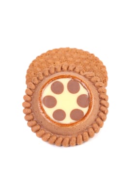 Brown chocolate biscuits with cream filling. Close up.