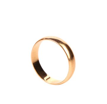 Lonely golden wedding ring isolated white background.