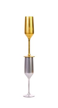 Golden and silver champagne glasses isolated on a white background.