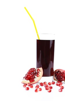 Opened pomegranate, seeds and juice. White background.