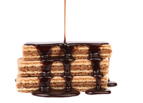 Coated stake wafers of chocolate. White background.