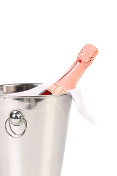 Bottle of champagne in cooler over white (with easy removable sample text)
