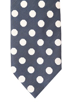 Polka dot necktie. Vertical. Close up. White background.