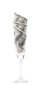 Wine glass with money isolated on white with clipping path