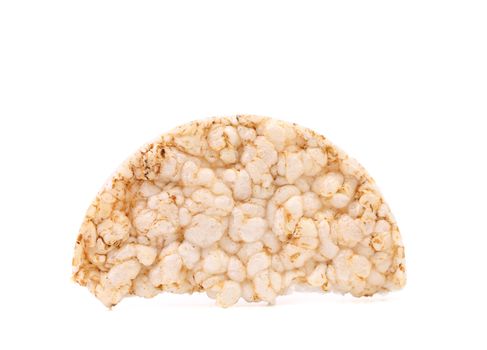 Half of rice cake. Close up. White background.