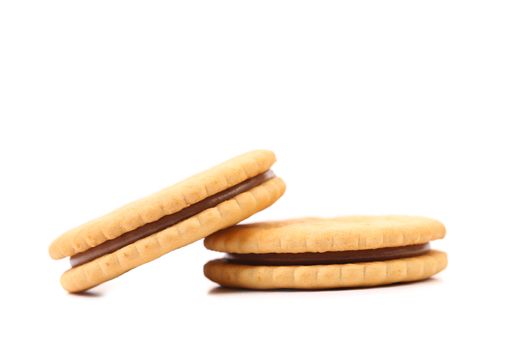 Closeup cookie biscuits with filling on white background
