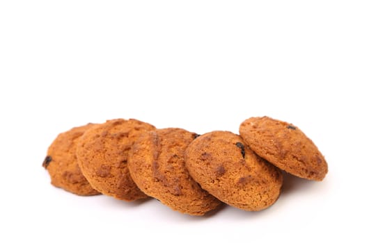Outmeal cookies with raisins. Close up. White background.