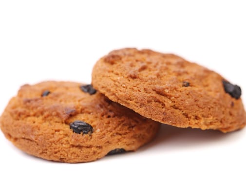Outmeal cookies with raisins. Close up. White background.