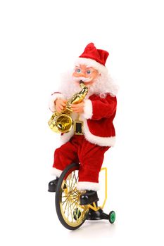Santa Claus plays the saxophone on bicycle. White background.