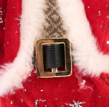 Santa Claus costume background with red furry suit and a black belt, Christmas or holiday theme