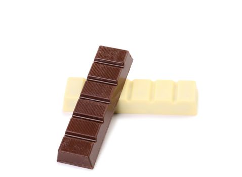 Black and white chocolate bar with filling on a white background