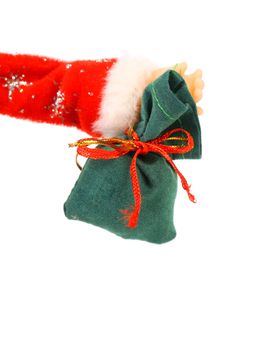 Santa Claus hand holds green sack full of presents over white background