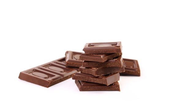 Stack of chocolate bars isolated on a white background
