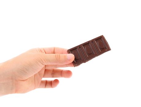 Hand holds chocolate bar. Isolated on a white background.