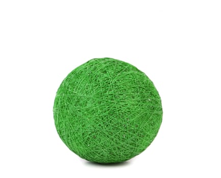 Ball of green thread. Isolated on a white background.
