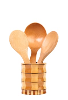Wooden spoons in a jar. Isolated on a white background.