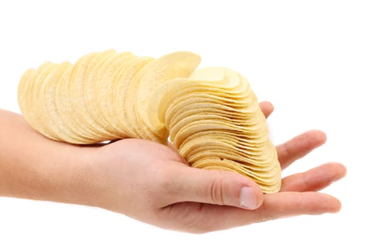 Hand holds chips. Isolated on a white background.