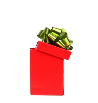 Opened red gift box with green-golden bow. White background.
