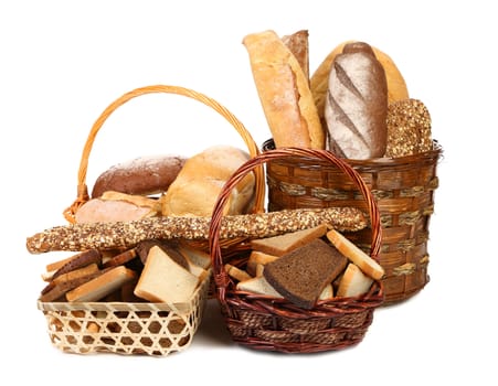 Fresh bread in baskets isolated on a white background