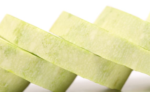 Fresh sliced marrow vegetable. Isolated on white background