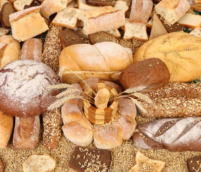 Composition of fresh bread, grain and wheat. Whole background.