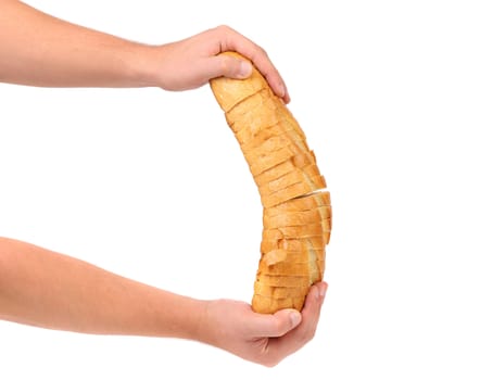 Hands holds sliced long loaf. White background.