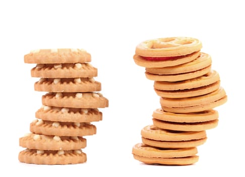 Stack of smile biscuits and another. White background.